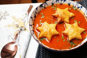 christmas soup recipe with pastry stars and festive spoon